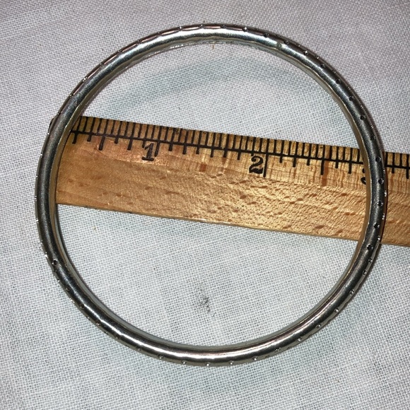 Set of 6 Silvertone bangle bracelets w/ appx 3” diameter, various textures $10 - Picture 3 of 7